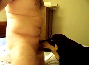 Dude gets a nice blowjob from a seductive dog